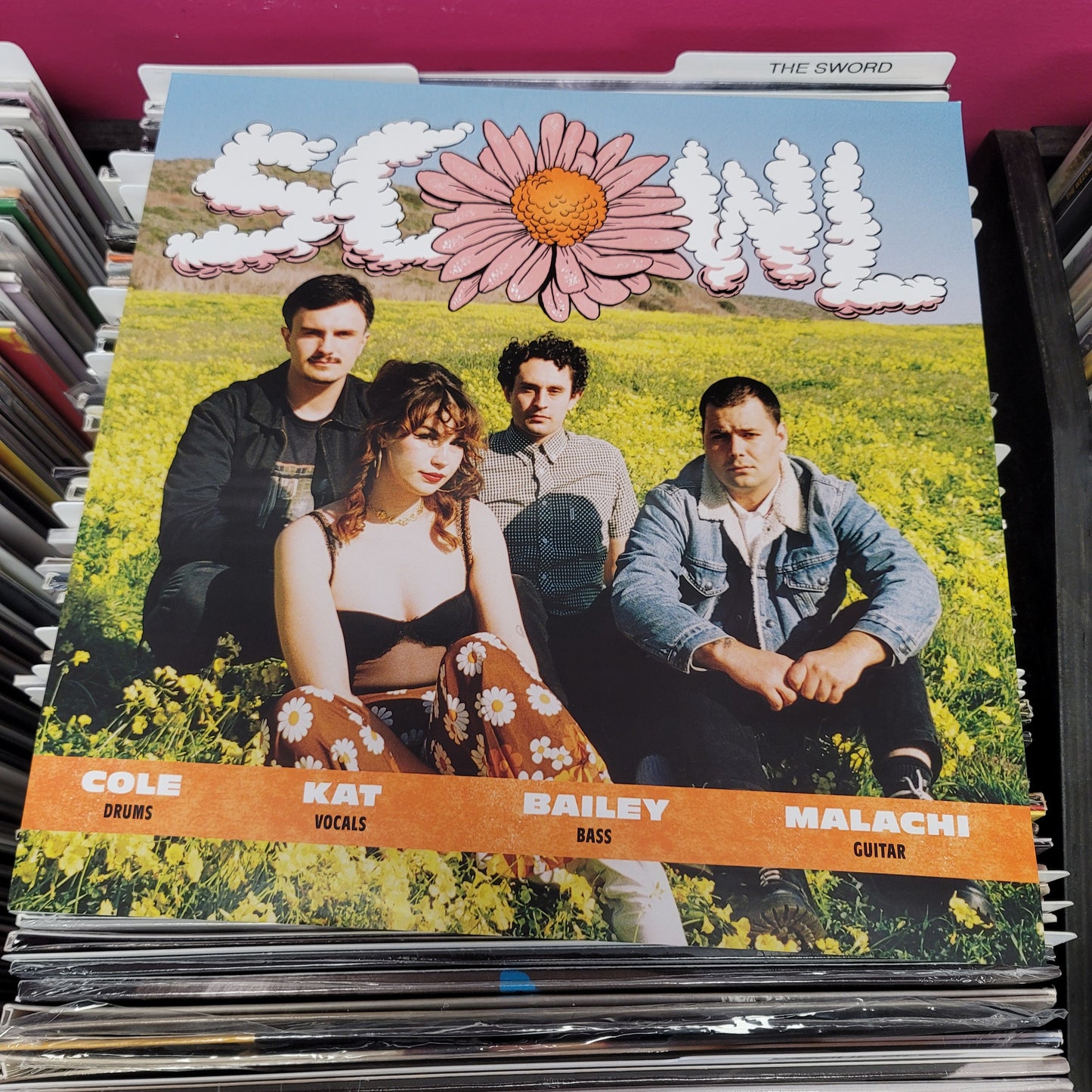 USED: Scowl - How Flowers Grow LP record (orange vinyl)