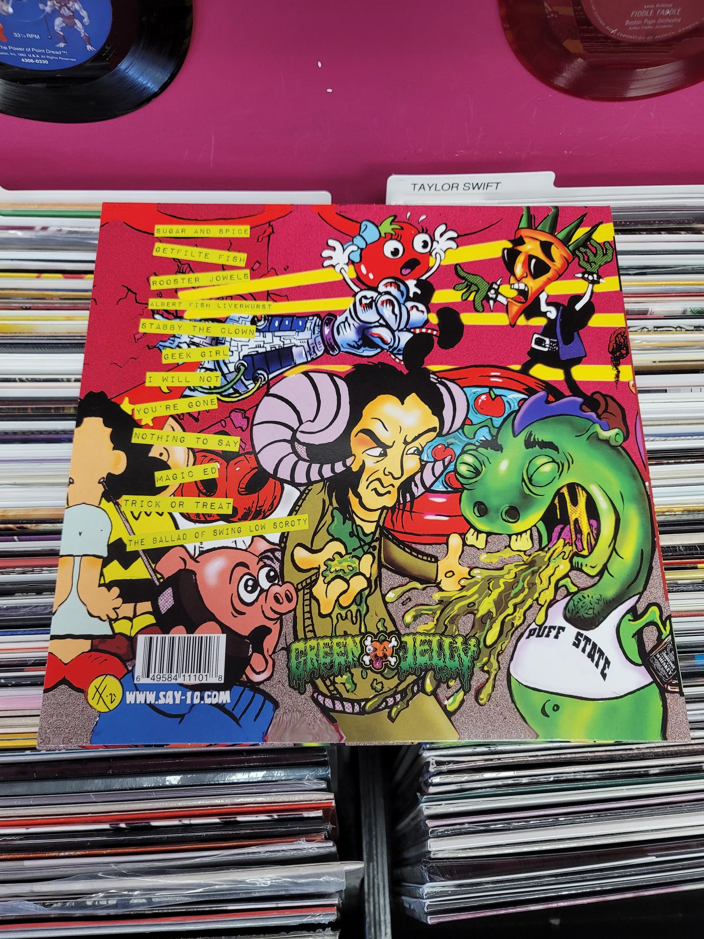 USED: Green Jelly - Musick To Insult Your Intelligence LP record (orange vinyl w/ black splatter)