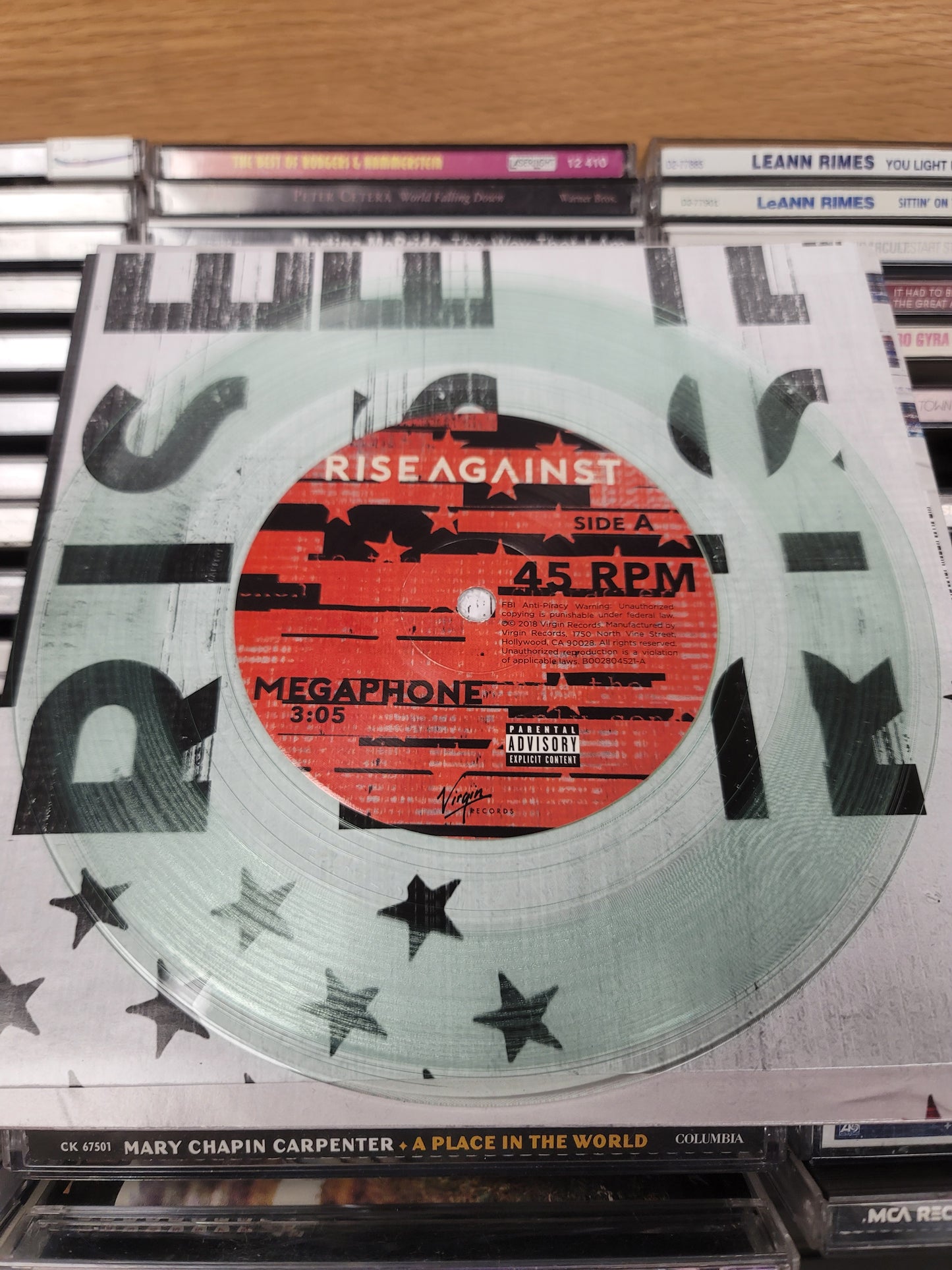 USED: Rise Against - Megaphone 7" single (coke bottle clear vinyl)