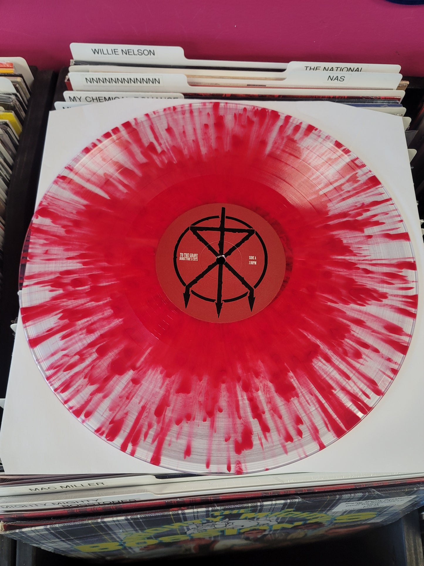 USED: To The Grave - Director's Cuts LP record (clear vinyl w/ red splatter)