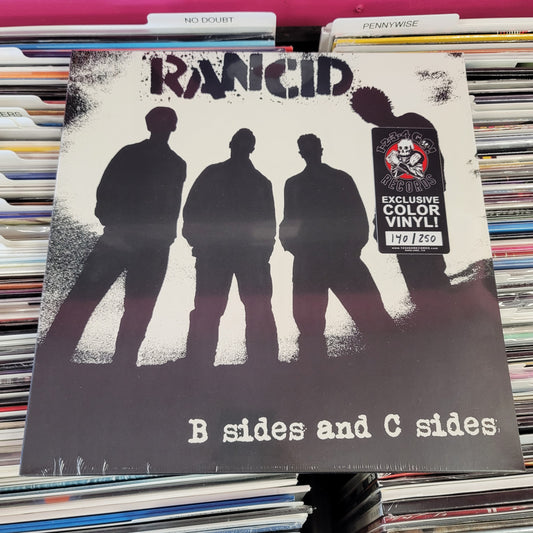 USED: Rancid - B-Sides and C-Sides LP record (glow in the dark splatter vinyl)