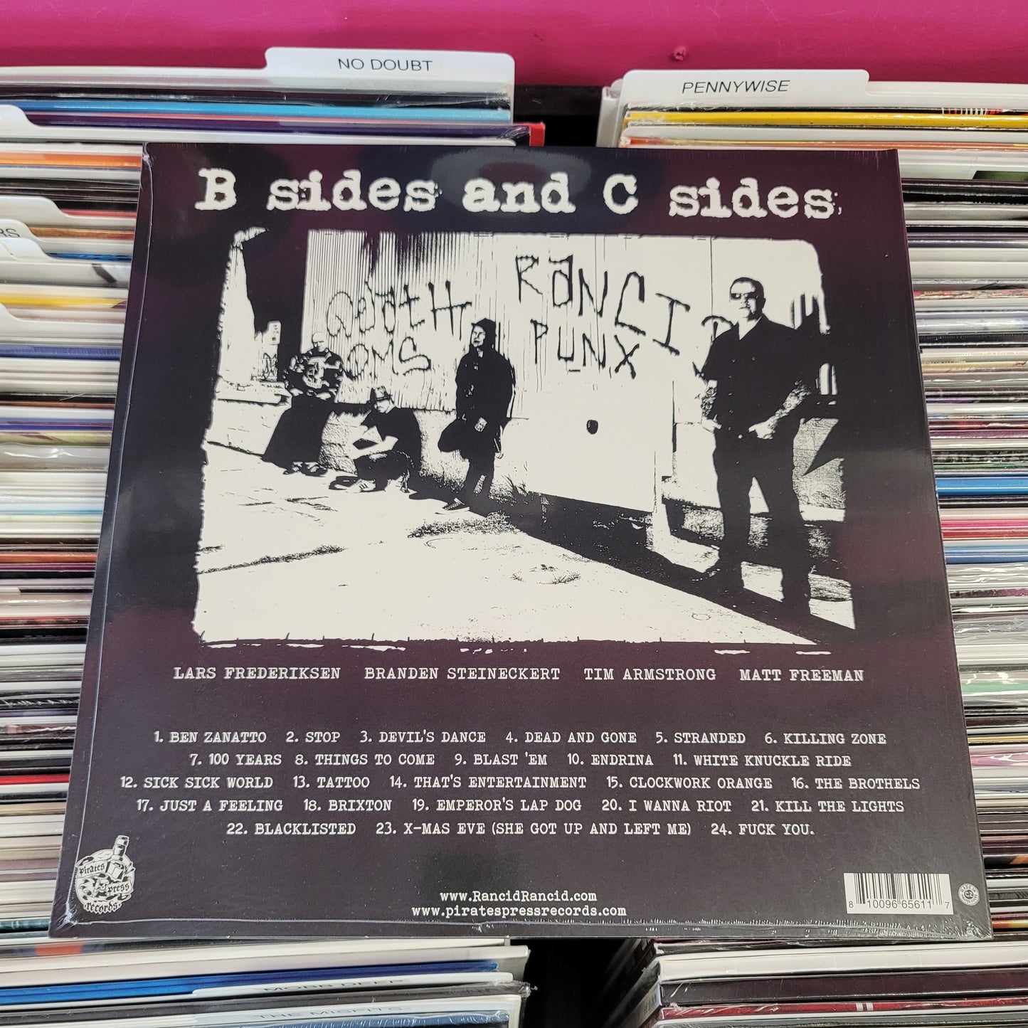 USED: Rancid - B-Sides and C-Sides LP record (glow in the dark splatter vinyl)