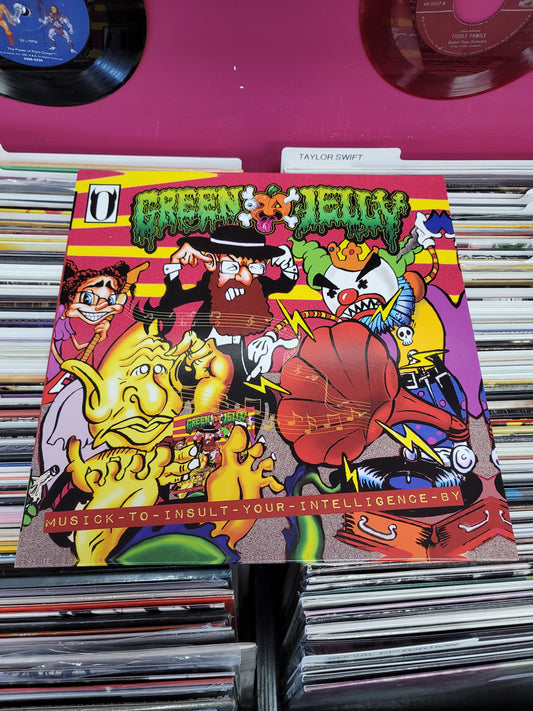 USED: Green Jelly - Musick To Insult Your Intelligence LP record (orange vinyl w/ black splatter)