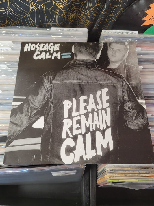 USED: Hostage Calm - Please Remain Calm LP record (clear vinyl)