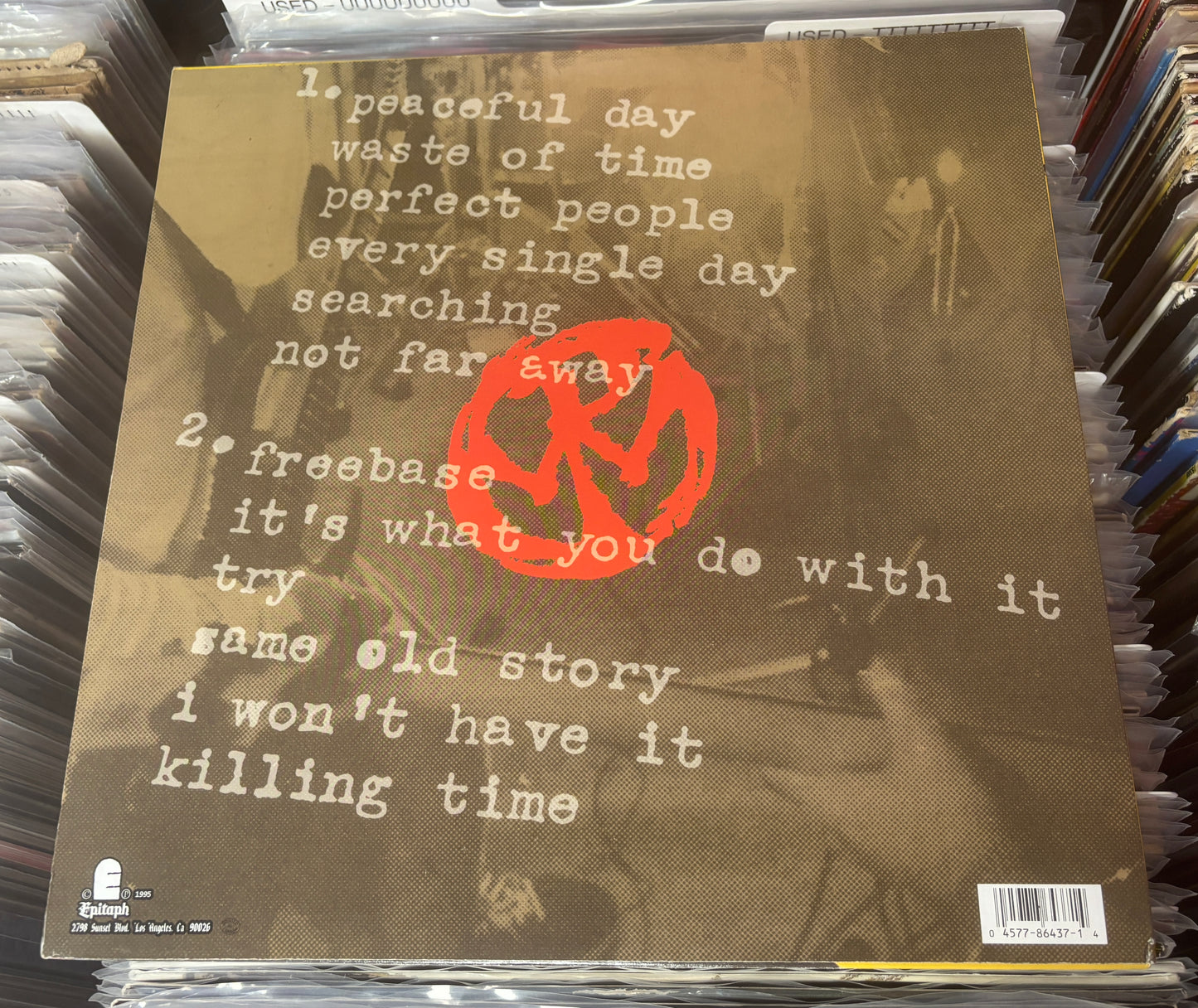 USED: Pennywise - About Time LP record (translucent yellow vinyl)