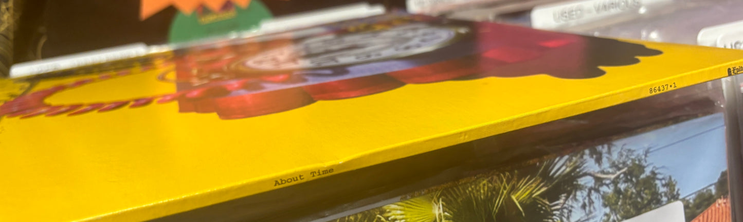 USED: Pennywise - About Time LP record (translucent yellow vinyl)