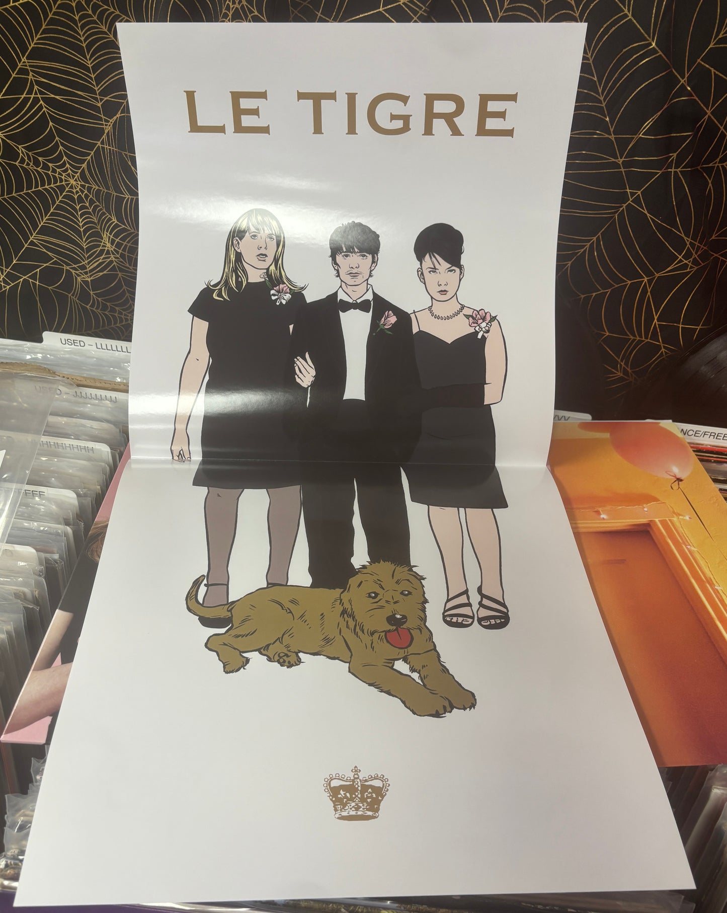 USED: Le Tigre - This Island LP record (black/blush w/ white splatter vinyl)
