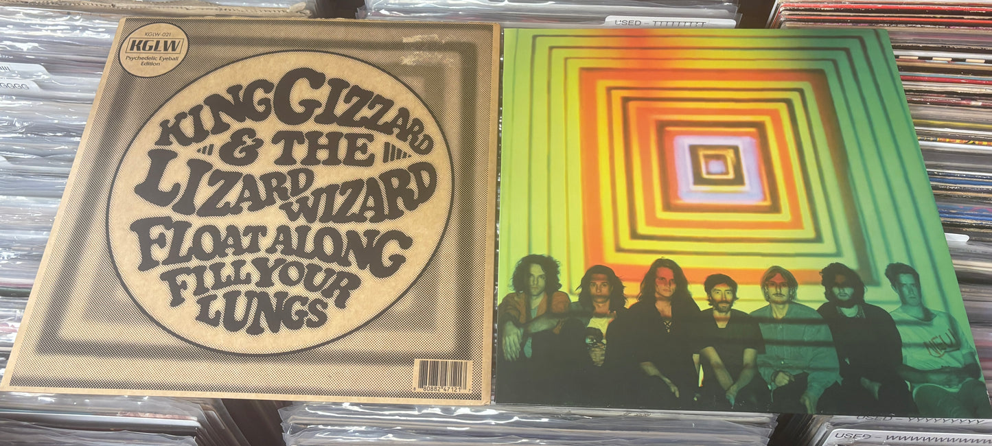 USED: King Gizzard and the Lizard Wizard - Float Along Fill Your Lungs LP record (Psychedelic Eyeball Edition - yellow w/ blue splatter vinyl)