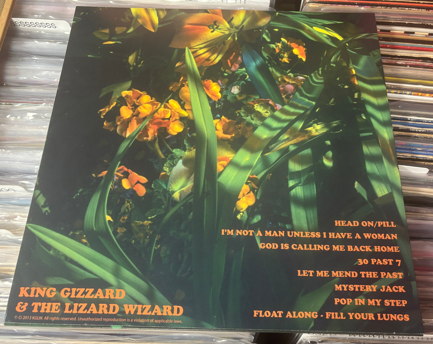 USED: King Gizzard and the Lizard Wizard - Float Along Fill Your Lungs LP record (Psychedelic Eyeball Edition - yellow w/ blue splatter vinyl)