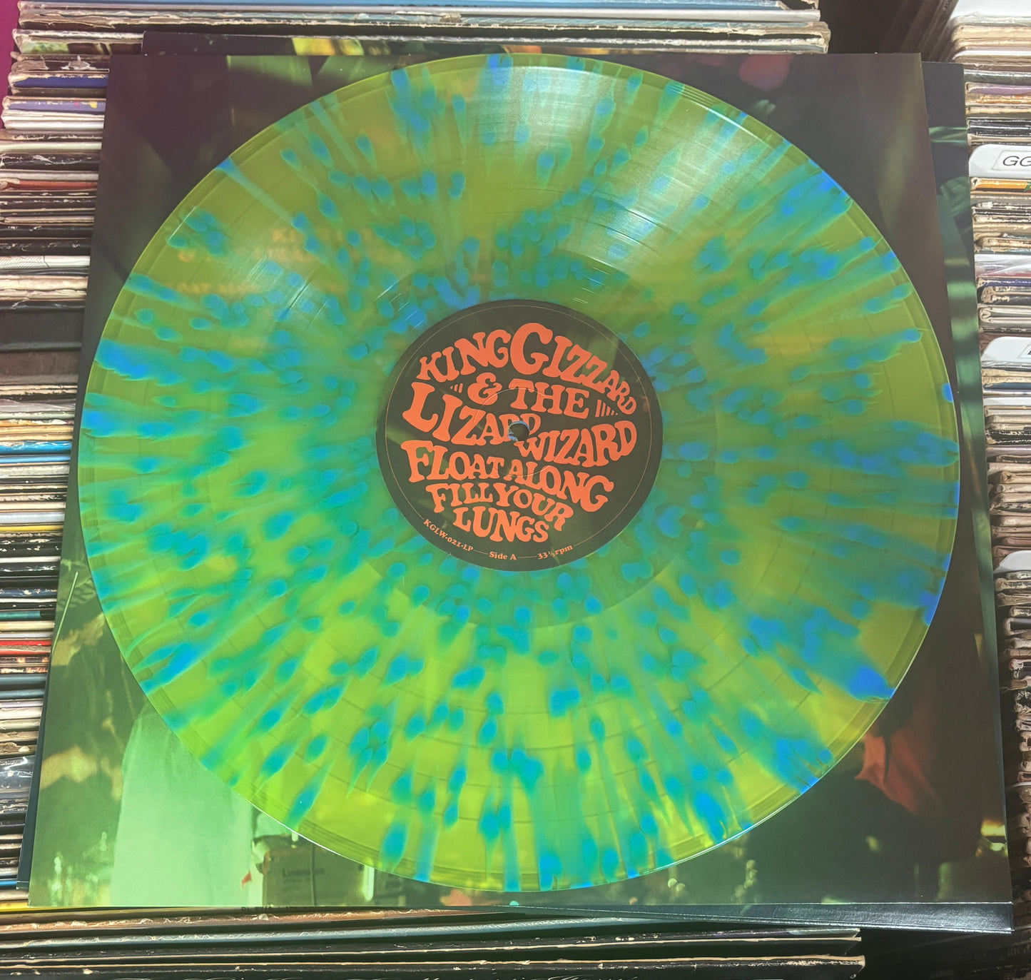 USED: King Gizzard and the Lizard Wizard - Float Along Fill Your Lungs LP record (Psychedelic Eyeball Edition - yellow w/ blue splatter vinyl)