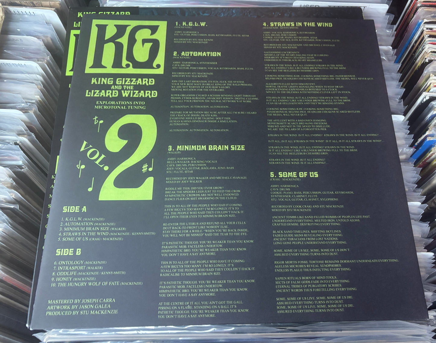 USED: King Gizzard and the Lizard Wizard - K.G. (Explorations Into Microtonal Tuning Vol. 2) LP record (orange vinyl)