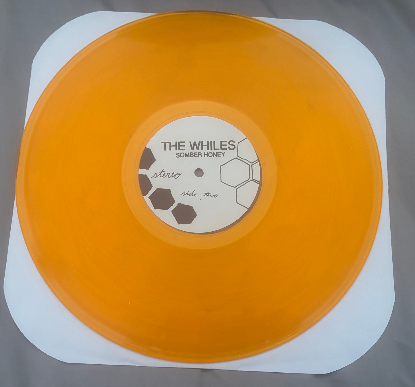 USED: The Whiles - Somber Honey LP translucent orange vinyl record
