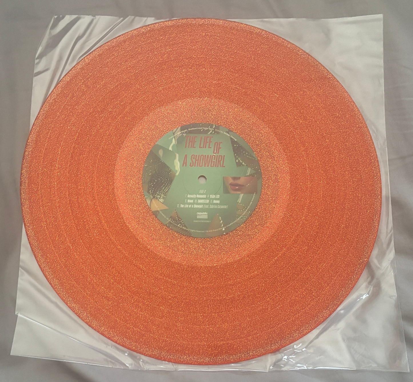 USED: Taylor Swift - The Life of a Showgirl LP orange glitter vinyl record
