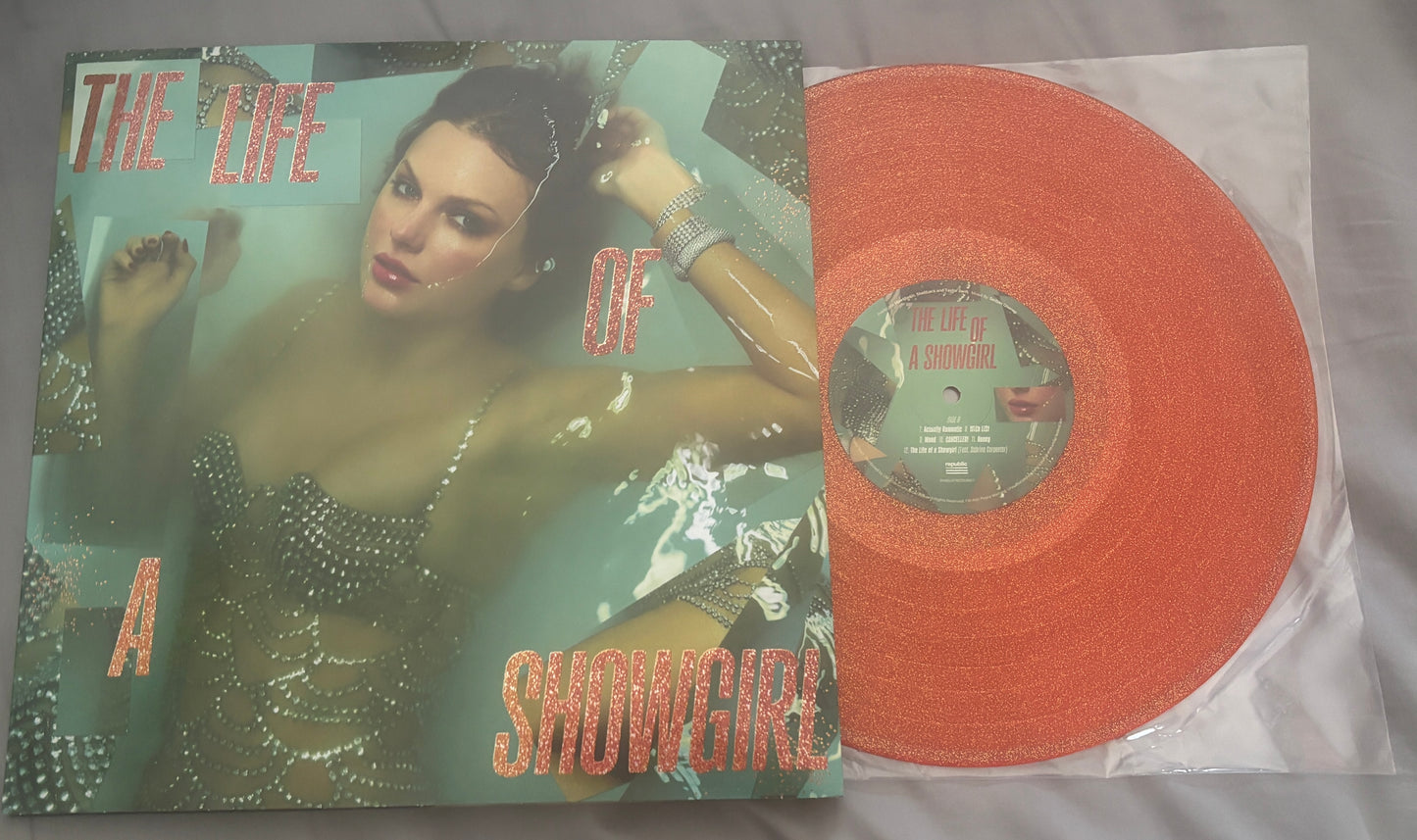 USED: Taylor Swift - The Life of a Showgirl LP orange glitter vinyl record