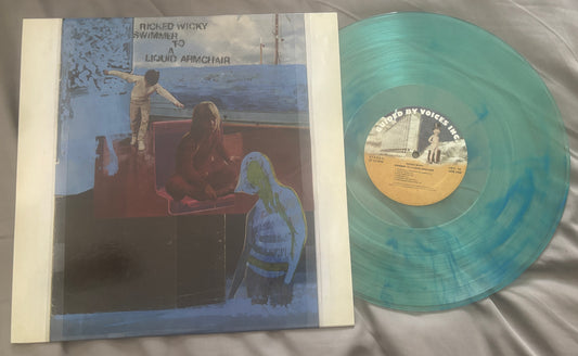 USED: Ricked Wicky - Swimmer to a Liquid Armchair LP coke bottle clear w/ opaque blue vinyl record (Limited to 1000 copies)