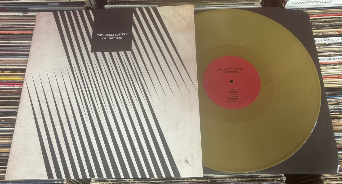 USED: The Casket Lottery - Feel the Teeth LP "Bell Penny Gold" vinyl record (Limited to 350)